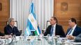 Caputo, Santilli y Weretilneck.